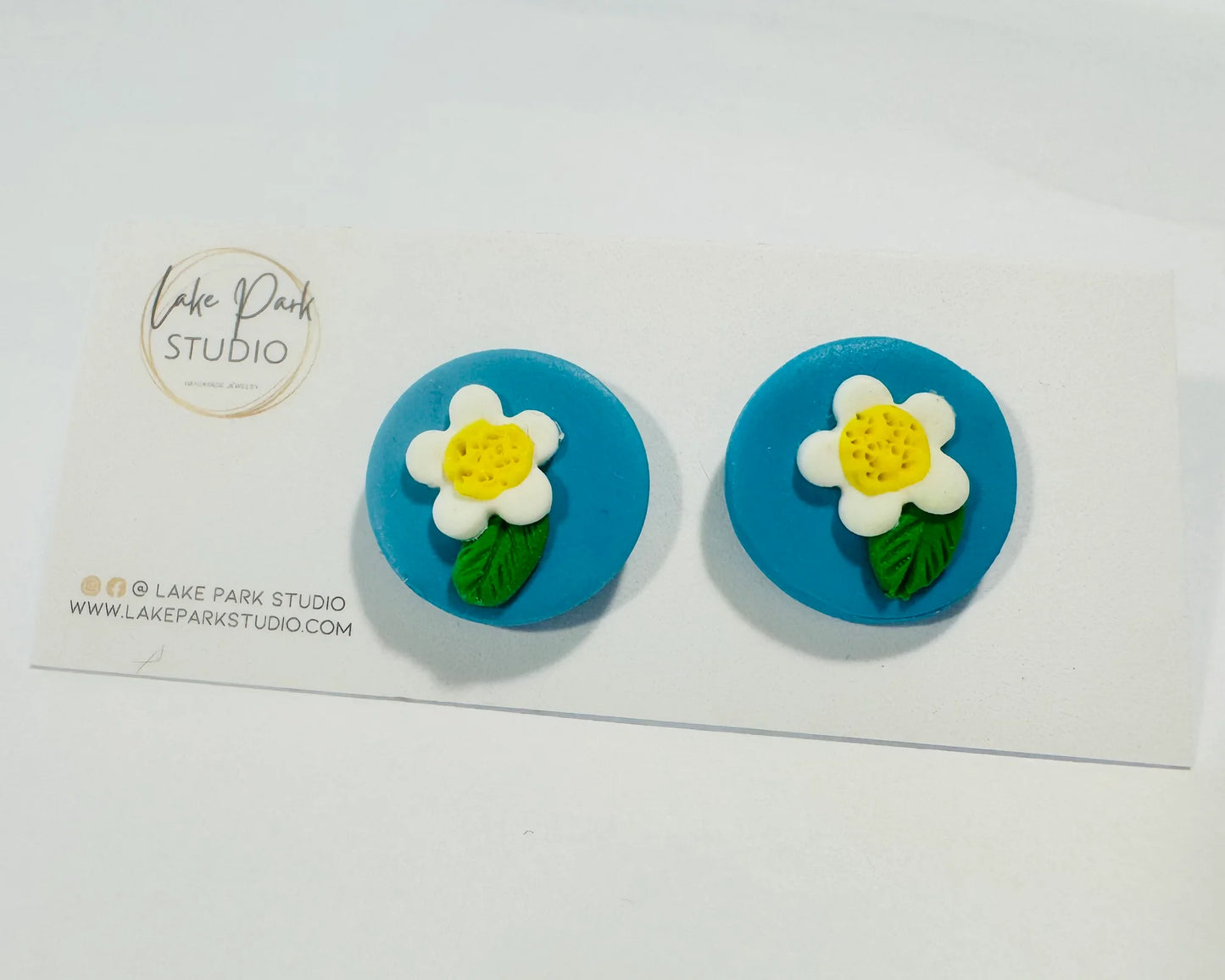 Azur ørestikkere med blomst