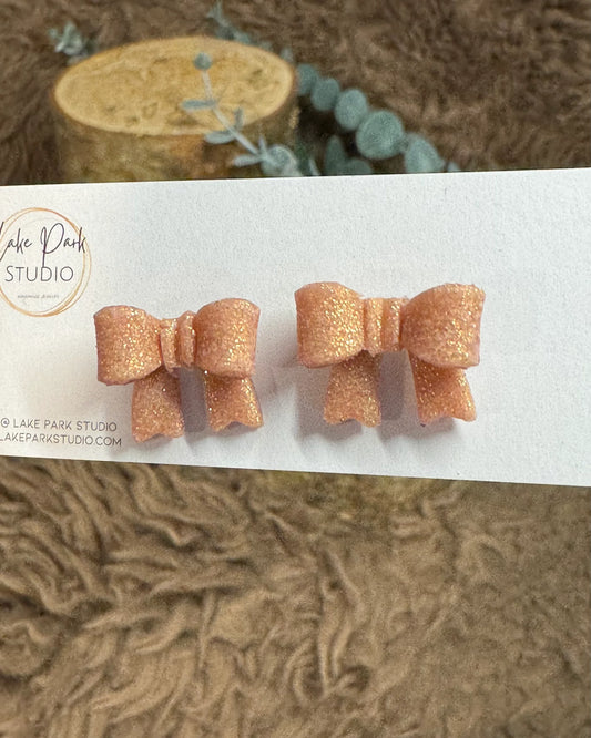 Små sløjfe ørestikkere - Rose Gold Glitter