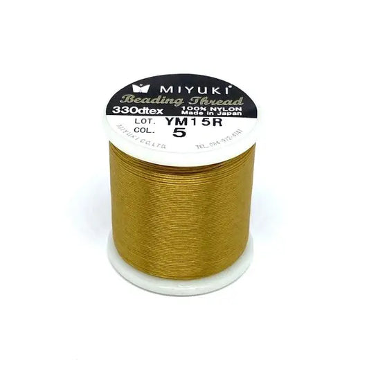 Miyuki nylon sytråd 0,25mm, guld 50m